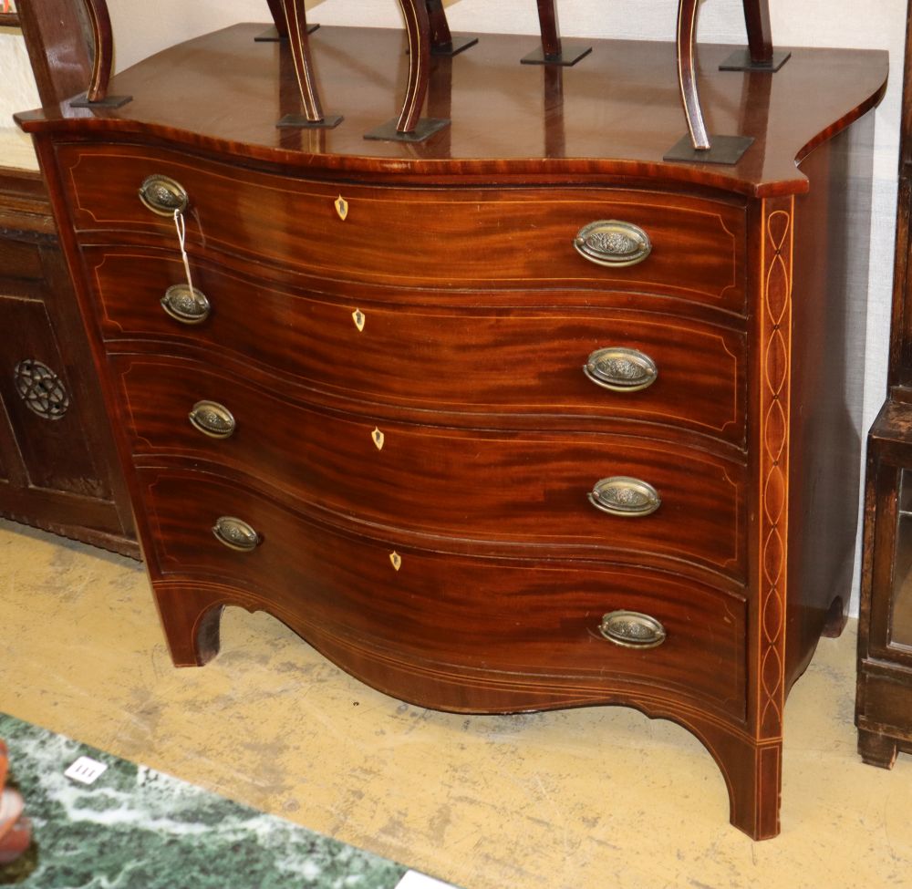 A George III line-inlaid mahogany chest of drawers of serpentine form, W.122cm, D.60cm, H.105cm